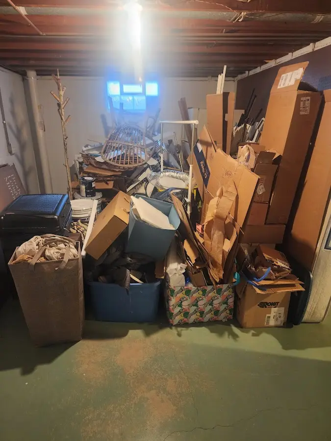 Roll-off dumpster container at job site for 6 Yard Dumpster Rental in Woodstock